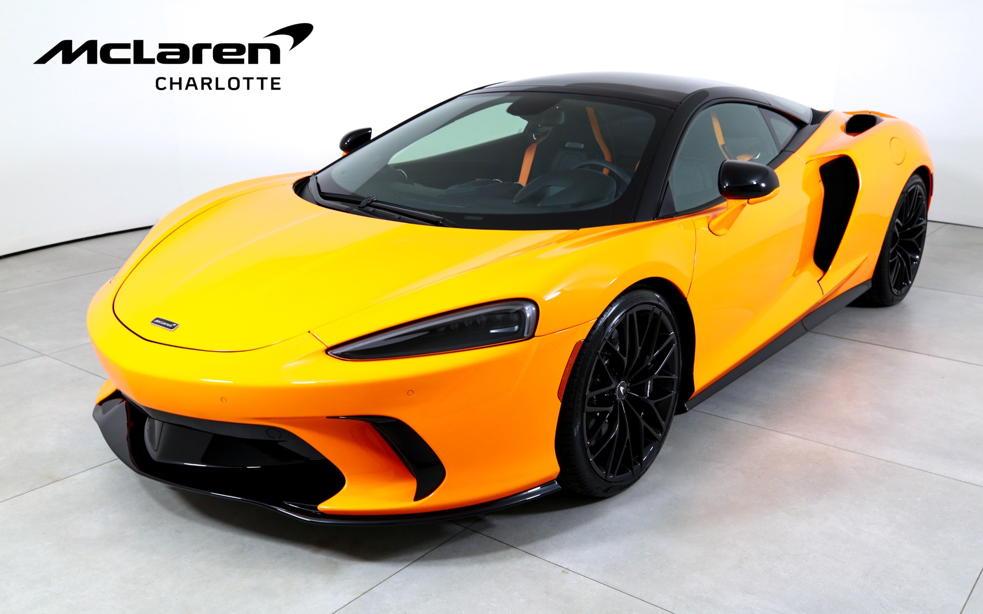 Orange 2027 McLaren GTS Coupe Rear-Wheel Drive 7-Speed Automatic